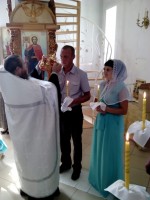 Барсуковы во время венчания